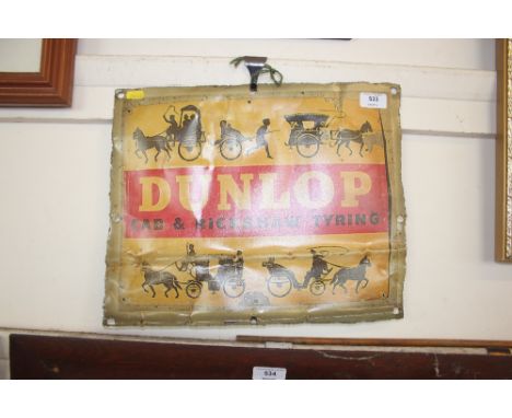A reproduction Dunlop advertising sign