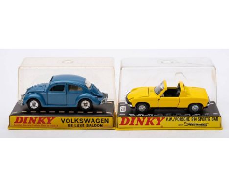 Dinky 129 Volkswagen Beetle De Luxe Saloon: blue with white interior spun hubs and treaded black tyres, together with Dinky 2