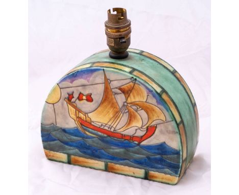 An Art Deco Crown Devon Fieldings half moon table lamp with galleon and light house decoration:, painted in colours , blue gl