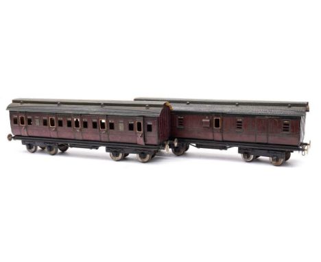 A Marklin Gauge 1 Midland Guard's coach No 2876 and Midland First/Third passenger coach: (some damage and repairs to both)(2)