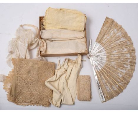 A small collection of lace and kid gloves, together with an Abalone and lace fan: (one stick damaged)