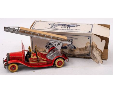 A tinplate clockwork fire engine:, with silver turntable and ladder, red lithograph printed cab, chassis, firemen and white t
