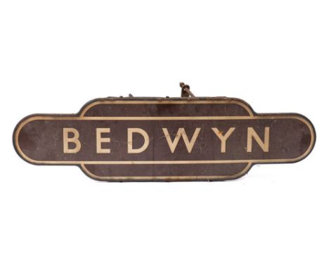 A BR (W) Totem 'Bedwyn':, cream and brown fully flanged edged with original mounting bolts, 92.8cm (storage patina and light 