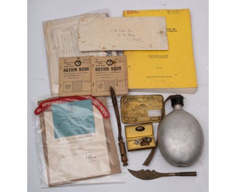 A collection of various militaria: including Honourable Artillery Company Shoulder badges, a Queen Elizabeth II Coronation ti