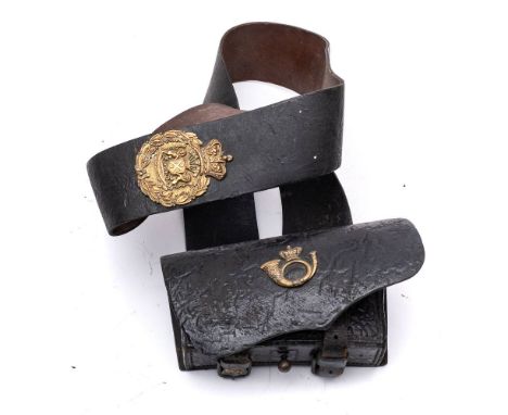 An early 19th century Royal Marines Light Infantry cartridge pouch: the pouch cover with brass infantry horn, the wide strap 
