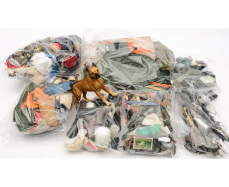 A collection of Action Man clothing, weapons and accessories: including two Exhibition boats, Space suit, football kit and st