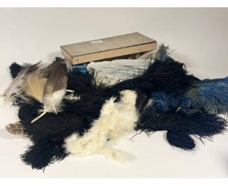 A collection of vintage costume feathers and trimmings and a finger puppet teddy bear. (alot)