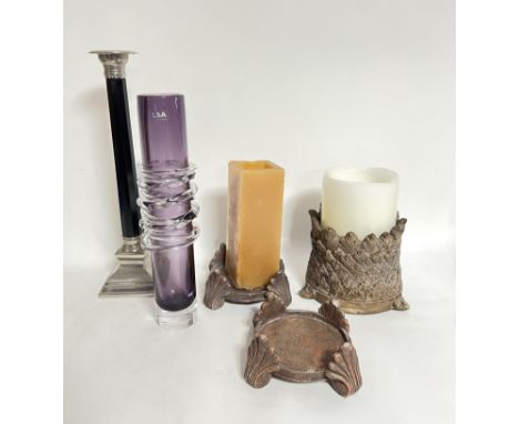 An LSA amethyst cylinder vase (h. x 41 cm) and a white metal mounted black faceted candle stick of classical form (h. x 48.5 