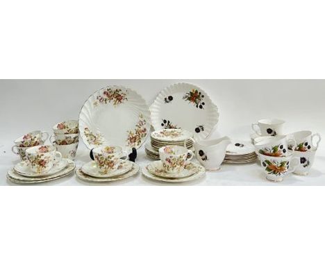 An Aynsley part tea service comprising eight cups, nine saucers, eight tea plates, and a sandwich/desert dish, together with 