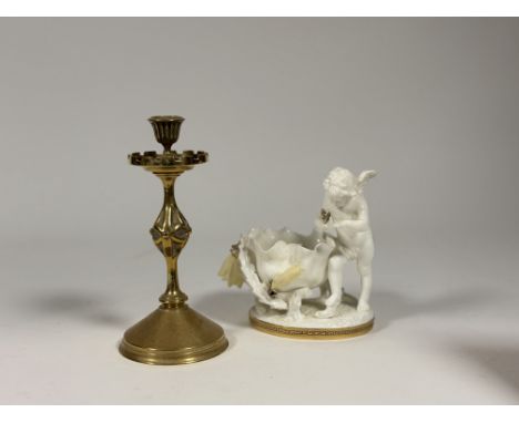 A late 19thc Moore porcelain sweetmeat basket decorated with cherub and gilt decoration and Greek key gilt decoration to base