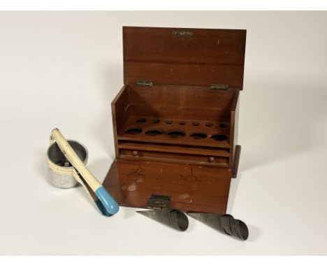 A collection of wares comprising, a set of eleven metal vintage cream horn moulds, a Hartley Product potatoes masher tool and