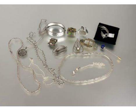 A collection of silver jewellery to include a silver spiral chain link necklace: l. x 23cm, a greek key pattern necklace; l. 