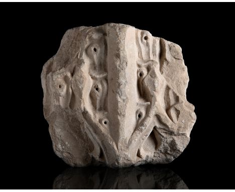 Decorative element. Gothic, 14th century.Stone carving.Measurements: 35 x 37 x 16 cm.Carved stone forming organic growths typ