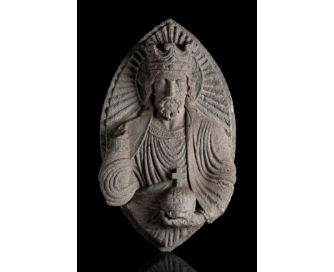 Pantocrator; France, 15th century.Stone.One of the hands is missing.Measurements: 70 x 42 x 23 cm.Delicate stone carving repr