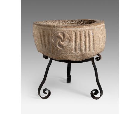 Romanesque baptismal font, 11th-12th century.Stone.Measurements: 22 x 50 x 50 cm.Baptismal font in carved stone with crosses 