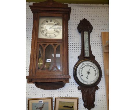 Oak 1930s Wall clock and a Oak carved wall banjo barometer