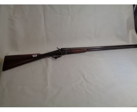 19thC Army &amp; Navy C.S.L. two barrel shotgun with chaised decoration to barrels and Walnut stock