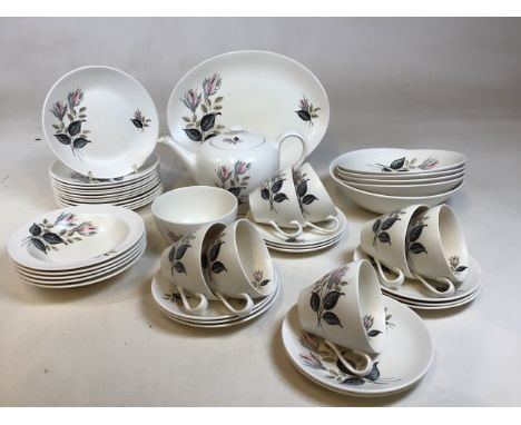 A mid century J&amp; G Meakin teas set in rose design, includes teapot, cups and saucers, tea plates, bowls and other items