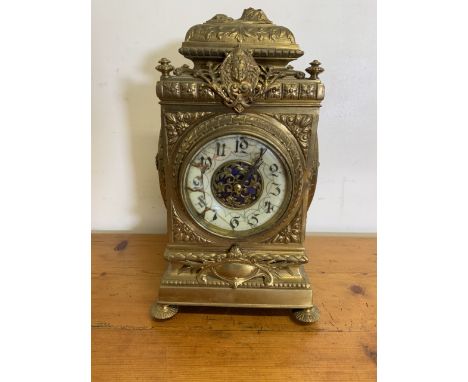 A large brass mantle clock. With enamel face (a.f). W:25cm x D:25cm x H:43cm