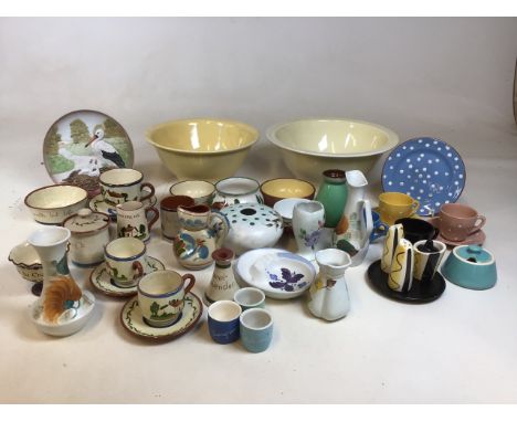 Quantity of ceramics including 2 large Bovey Pottery bowls, bantam pottery bowl, Radford pottery and mottoware