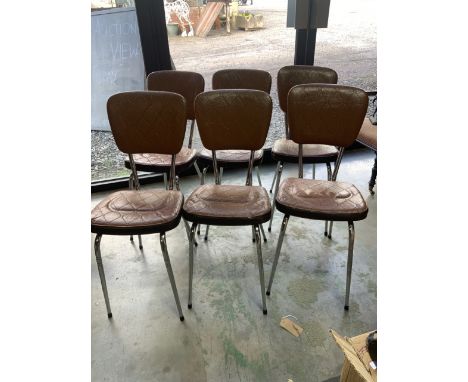 A set of six vintage chrome and  leatherette stacking chairs. 