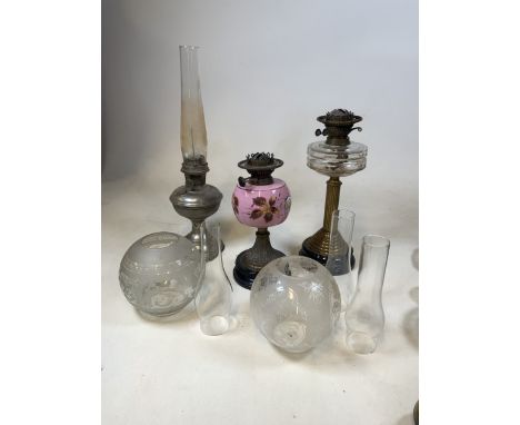 Aladdin oil lamp model 12, Height 60cm, a Wright &amp; Butler painted base oil lamp and a Duplex oil lamp also with 3 glass c