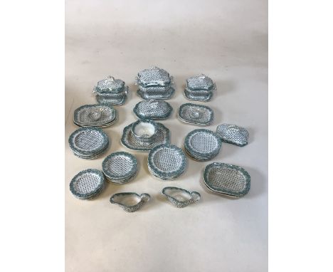 A Victorian green and white earthenware childs / dolls part dinner service, transfer printed with star motif to include turee