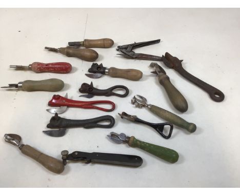 A quantity of vintage tin openers including bull head openers