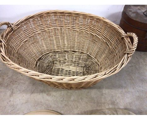 Vintage baskets, light shades and a metal hat box. 