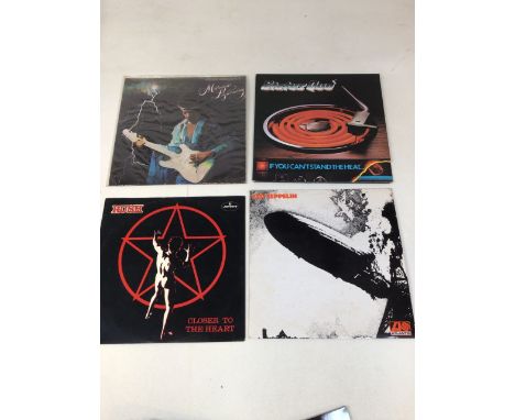 LPs and Singles:Led  Zeppelin one, Jimi Hendrix Midnight Lightening, Rush Closer to the Heart, Status Quo Hello, If you cant 