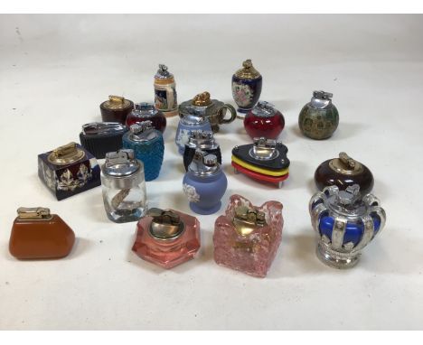 A collection of vintage lighters including Colibri, Lucite, Jasperware and others 