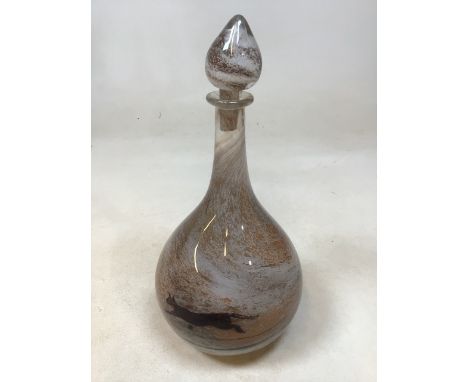 An art glass decanter with mottled design of cats running around the base. Chip to inside of stopper W:14cm x H:32cm