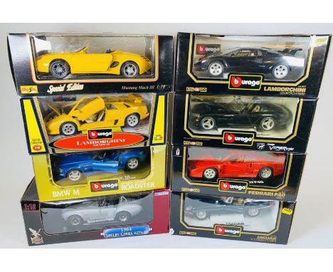 A collection of 1:18 Scale Die Cast Vehicles - To include: Burago, Maisto and Road Legends (8)