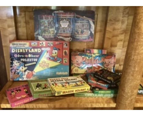 A vintage Childhood 1960s selection of Games and Play Toys. To include a large format Chad  Valley Disneyland Projector with 