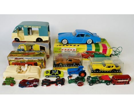 A collection of 1960's Toys, to include a Marx Dr Who Dalek, Marx friction drive sports car, W Toys Ferrari Battery Operated 