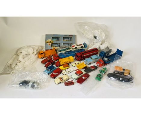 A collection of unboxed die cast cars, trains. models etc. includes a Tri Ang spot on box, however the models are not present