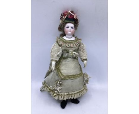 French 1870 Fine Poupée de Mode, French Fashion doll 31cm with bisque head, pierced ears ,deep cut slant with cork pate and o