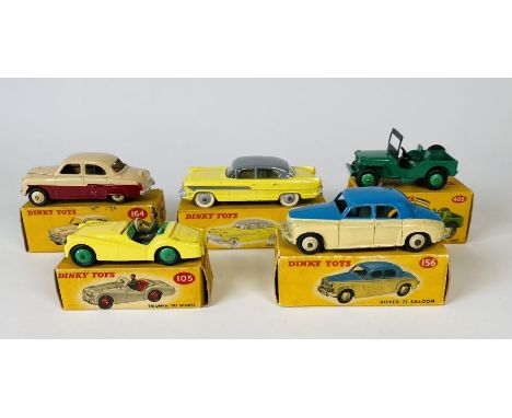 Dinky Toys, No.105 Triumph TR2 Sports, (lemon yellow body with grey driver, green interior, green hubs) in picture card box.&