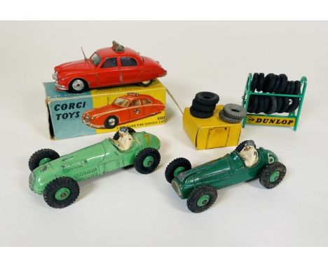 A Corgi Toys No. 213, (PLAYWORN) 2.4 Jaguar Fire Service Car (red body with spun hubs)&nbsp; With picture box, yellow and blu