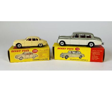 Dinky Toys No.195 Jaguar 3.4 MkII saloon, (cream with red interior, gloss black base) in light yellow picture box. Dinky Toys