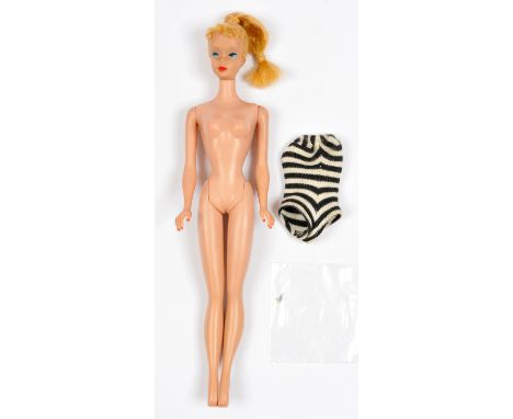 Mattel Barbie #4, late 1960-early 1961, blonde ponytail with soft forehead curls, tan complexion, blue eyeliner, rich ruby re