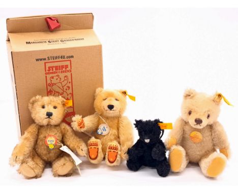 Steiff group including: (1) Petsy miniature decade bear, yellow tag 029035, mohair, chest tag, swing label, within Good box, 
