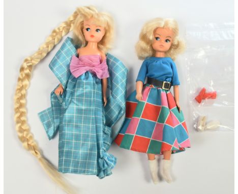 Pedigree Sindy pair of vintage dolls: (1) Cut n Style, wearing Barbie blue tartan sateen evening dress; (2) Blonde, wearing 1