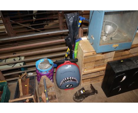 A childs suitcase, pogo stick etc 