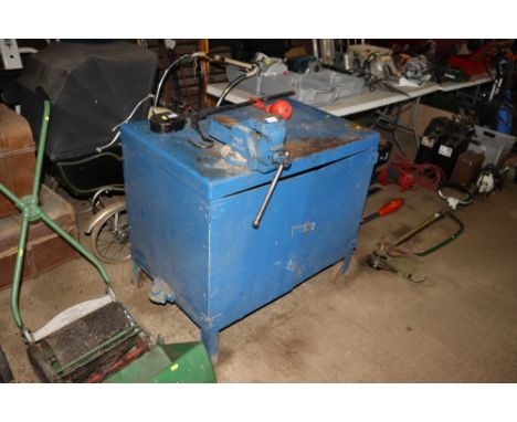A tool cabinet / workbench with fitted metal vice