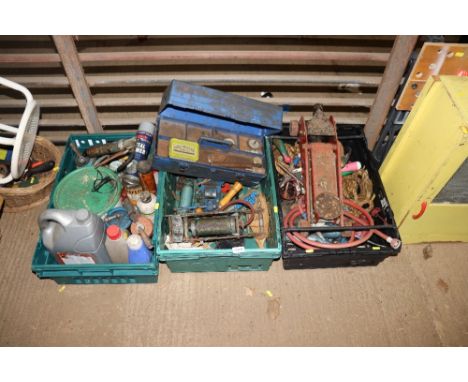Three trays of assorted hand tools including bench vice, foot pump, various paints, blow torch, trolley jack