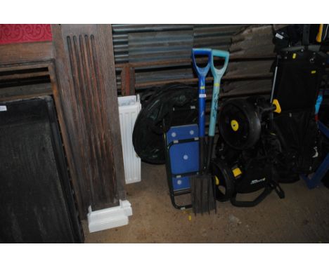 A spade, fork, garden kneeler etc