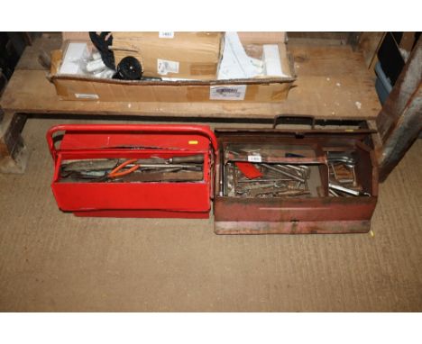 Two cantilever tool boxes and contents of various spanners and hand tools