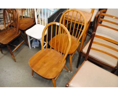 Two Ercol stick back chairs