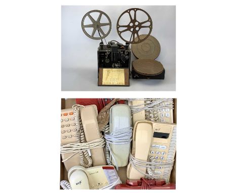 G B EQUIPMENTS LTD MODEL L.516 PROJECTOR, no. 8461-909, with 4 x spools, two in tins, and 7 x retro push button telephones